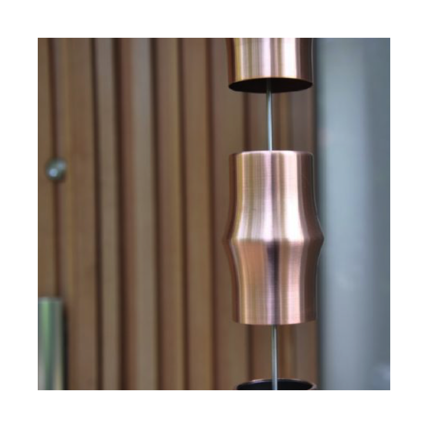 Take Rain Chains from Japan. Made from stainless steel with softer curves